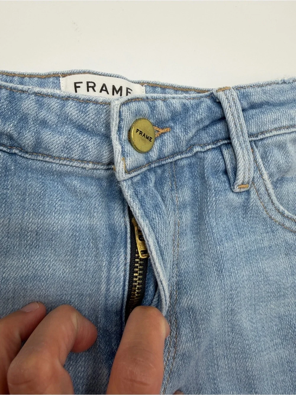 Frame Denim Shredded Raw-Edge Denim Shorts in Hurrah 26